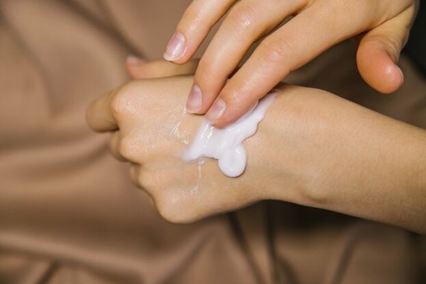 applying anti-parasite medications to the skin
